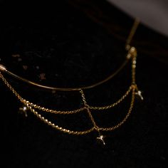 A necklace that looks like a constellation connecting stars. A design with a golden chain hanging down. Glossy stars emit a dazzling light. It has an elegant atmosphere as it sways every time you walk. A retro item with an exotic scent. 
 
 
 Item 
 
 Necklace 
 
 
 Size 
 
 Necklace decoration part 
 
 Height: 5.3cm 
 Width: 9.4cm 
 
 
 
 Material 
 
 Alloy 
 
 
 Others 
 
 If you have a metal allergy or the plating does not suit your skin, please refrain from ordering. Celestial Party Jewelry With Adjustable Chain, Gold Plated Clavicle Chain Necklace For Party, Party Dangle Necklaces With Delicate Chain, Party Necklace With Delicate Dangle Chain, Party Dangle Necklace With Delicate Chain, Gold Celestial Dangle Necklaces, Gold Celestial Dangle Necklace, Dainty Dangle Chain Necklace For Party, Gold Celestial Necklace For Party