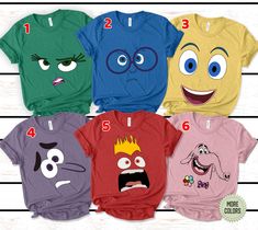 five t - shirts with faces and numbers for each child's face, all in different colors