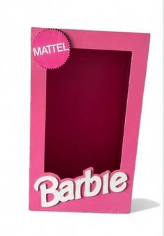 a pink cardboard box with the word barbie on it's front and back side