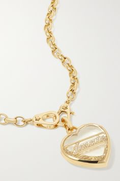 Foundrae's necklace is the perfect gift for a loved one. Handmade from polished 18-karat gold, the heart-shaped pendant is decorated with a diamond-encrusted plate that spells out the Italian word for love and covered with a clear quartz cap. The chunky belcher chain has two clasps at the front, so you can add more charms as you please. Luxury Heart Pendant Necklace, Luxury Gold-plated Jewelry With Heart Charm, Luxury White Gold Necklaces With Heart Charm, Luxury White Gold Necklace With Heart Charm, Luxury Gold Plated Heart Pendant Jewelry, Luxury Heart-shaped Diamond Necklace With 17 Jewels, Luxury Gold Diamond Necklace For Valentine's Day, Luxury Heart Cut Gold Plated Necklace, Luxury Gold Plated Heart Cut Necklace