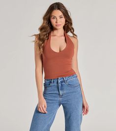 This halter top is designed with a double-lined brushed knit fabric offering plenty of stretch for comfortable wear. It features a sleeveless plunging V-neckline with a trendy halter strap, an open back, a mid-length hem to pair with your fave low-rise jeans, and a form-hugging fit.Fit & FeaturesStretchy double-lined brushed knit fabricPlunge V-necklineHalter strapOpen backMid-length hemForm-hugging fitRuns true to size Casual Halter Neck Top In Elastane, Casual Halter Neck Tops In Elastane, Casual Halter Neck Top, Casual Elastane Halter Neck Top, Trendy Seamless Backless Top, Versatile Halter Neck Seamless Tank Top, Chic Seamless Racerback Halter Top, Seamless Halter Neck Elastane Tank Top, Seamless V-neck Halter Top For Spring