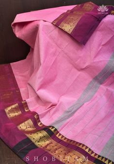 Incorporating traditional weaves in your ethnic wear has never been this easy!!  Woven in the culture-rich region of kanchipuram, these sarees are easy to drape and carry! It is set in an eye catching combination with charming zari work!  The saree is not woven with a blouse fabric, but is versatile enough to mix and match with contrasting ones including white! The saree has falls and pico done. Note: There may be a slight difference in shade between the actual product and what you see on screen due to variance in screen settings and other factors. Note: This saree is woven out of pure natural cotton. There may be minor inconsistencies owing to it. Being characteristic, they are not considered defects. Kanchi Cotton Saree, Zari Work, Blouse Fabric, Cotton Saree, Blouse Piece, Ethnic Wear, Salwar Kameez, Natural Cotton, Blazer Suit