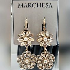 Stunningly Gorgeous White Pearl & Champagne- Colored Crystal Lever-Back Pierced Earrings From Marchesa. Measures Approximately 2.5"L. Each Earring Is Stamped On The Back With The Marchesa Logo. Makes A Wonderful Gift And Arrives In A Black Velvet Pouch To Help Keep Your Item In New Condition. A Gorgeous Earring To Add To Your Jewelry Collection! Smoke Free Home Please Carefully Refer To All Photos Prior To Purchasing Contact With Any Questions Marchesa Jewelry, Pearl Crystal, Velvet Pouch, Champagne Color, Marchesa, Floral Earrings, Pierced Earrings, Gorgeous Earrings, Color Crystal