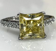 Canary Yellow Princess  Cut With Round by InfinityJewelersUSA Princess Cut Cubic Zirconia Wedding Ring With Accent Stones, Cubic Zirconia Princess Cut Wedding Ring With Accent Stones, Princess Cut Diamond White Ring With Accent Stones, Princess Cut Diamond Ring With Accent Stones, Asscher Cut Cubic Zirconia Rings With Accent Stones, Princess Cut Cubic Zirconia Ring With Center Stone, Cubic Zirconia Princess Cut Ring With Center Stone, Dazzling Princess Cut Rings With Accent Stones, Princess Cut Cubic Zirconia Rings With Diamond Accents