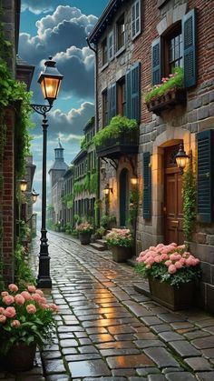 a cobblestone street with pink flowers and green shutters on both sides, under a cloudy sky