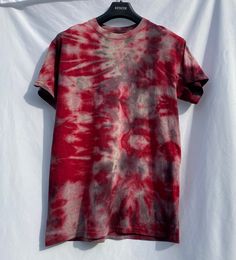 Medium unisex red based Tshirt, hand tie dyed. Wash in cold water, hang dry! Red Short Sleeve T-shirt For Festivals, Tie Dye T-shirt With Natural Dye And Crew Neck, Red Cotton T-shirt For Festival, Tie Dye Crew Neck T-shirt With Natural Dye, Red Short Sleeve Festival T-shirt, Casual Tie Dye T-shirt With Natural Dye, Hand Dyed Acid Wash T-shirt For Festivals, Tie Dye T-shirt With Natural Dye And Short Sleeves, Pre-washed Tie Dye T-shirt With Crew Neck