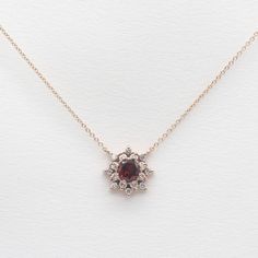 14k Garnet Flower Diamond Necklace / Dainty Garnet Snowflake Pendant / 14k Natural Garnet Necklace / January Birthstone / Snowflake Necklace / Delicate Necklace ◈ Pendant Details ◈  > Metal: Solid 14K White Gold, Rose Gold & Yellow Gold > Center stone: 5mm Round Cut Natural Garnet > Stone Treatment: NOT Enhanced ALL NATURAL > Length: 14'' - 20" > Side Diamonds: 1.8mm x 8 (0.21ct) / 1.5mm x 8 (0.13ct) > Total Carat Weight: 0..34ct > Diamond Color: G  > Diamond Clarity: VS2-SI1  All diamonds are 1 Flower Diamond Necklace, Snowflake Necklace, Snowflake Pendant, Dainty Pendant, Garnet Necklace, Pink Morganite, January Birthstone, 14k Gold Necklace, Garnet Stone