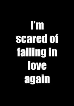 the words i'm scared of falling in love again are white on black background