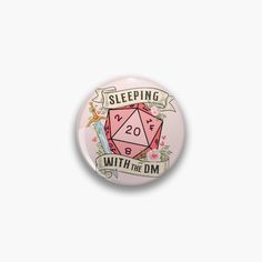 a pink button with the words sleeping with the dm on it and an image of a