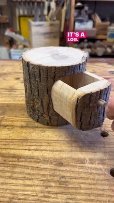 a piece of wood that has been cut in half and is sitting on a table