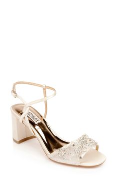 A breathable vamp strap is embellished with glittering beads and crystals on this elegant sandal set on a cushioned footbed and walkable block heel. 2 3/4" heel Adjustable ankle strap with buckle closure; hidden elastic inset Cushioned insole Textile and synthetic upper and lining/leather sole Imported Women's Shoes | Badgley Mischka Blaine Sandal Elegant Sandals, Bridal Heels, Strap Sandals Women, Embellished Sandals, Only Shoes