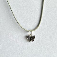 Handmade Necklace , Silver Butterfly Charm , Adjustable Adjustable Silver Dainty Necklace, Dainty Adjustable Silver Necklace, Silver Adjustable Dainty Necklace, Silver Jewelry With Adjustable Cord, Adjustable Butterfly Charm Jewelry For Everyday, Adjustable Everyday Jewelry With Butterfly Charm, Adjustable Silver Necklace With Charms, Minimalist Silver Butterfly Charm Jewelry, Dainty Adjustable Silver Charm Necklace