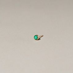 Emerald cabochon measures 4mm | Bezel setting on post with push backing | Set in 14k yellow gold | Sold as a single earring; please select a quantity of two for a pair #mociun #stud #gold #goldstud  #earring #goldearring #emerald #emeraldearring #birthstone #birthstonestud Minimalist 14k Gold Jewelry With Cabochon, Minimalist Yellow Gold Cabochon Jewelry, 14k Gold Jewelry With Cabochon For May Birthstone, 14k Gold Cabochon Gemstones Fine Jewelry, 14k Gold Cabochon Gemstones In Fine Jewelry Style, Cabochon Gemstones In 14k Gold Fine Jewelry, 14k Gold Cabochon Round Band Jewelry, 14k Gold Round Band Cabochon Jewelry, Yellow Gold Cabochons With Bezel Setting For Gift