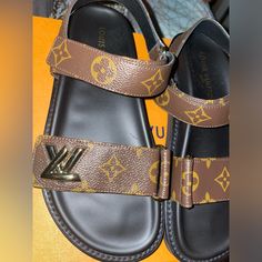 Louis Vuitton, Comfort Sandal, Lv Gold Accessory, Adjustable Velcro Straps, Comfort Trend, Never Worn Luxury Brown Sandals With Round Toe, Designer Brown Open Toe Sandals, Designer Open Toe Brown Sandals, Designer Brown Sandals For Vacation, Louis Vuitton Slides, Shoes Louis Vuitton, Rope Sandals, Louis Vuitton Red, Louis Vuitton Sandals