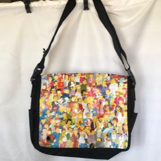 Nwt Jibbitz The Simpsons Characters Messenger Bag. Reversible Flap Cover That Can Be Changed Via The Velcro. Measures Approximately 16 X 12 X 4 Inches. Casual Reversible Shoulder Bag For School, Casual Reversible Black Shoulder Bag, Casual Black Reversible Shoulder Bag, Casual Black Reversible Bag, Fun Black Shoulder Bag For Travel, Casual School Shoulder Bag With Snap Closure, Reversible Tote Shoulder Bag For School, Casual Reversible Multicolor Bag, Casual Reversible Satchel Shoulder Bag