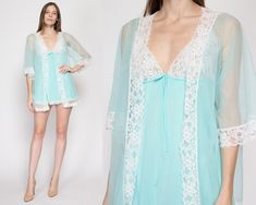 Vintage 60s/70s mini peignoir set in blue with white lace trim. Features a short babydoll nightie, and an open fit sheer robe. Measurements and Condition:  Fits like: Women's medium (also works well on a bigger size small, the nightie was just slightly loose in the bust on model) Fabric: Nylon Brand: Unknown, made in USA Condition: Very good, with some seam gaps along the upper back of the nightie, and some tiny scattered snags/pinpoint holes throughout the sheer blue fabric of the robe. NIGHTIE Length: 28" Underbust: elastic stretches 24" to 33" comfortably Hips: 46" ROBE Length: 28.5" Chest: 47" Shoulder (seam to seam): 14" Sleeve: 15.5" Shown on a 5'9" model with measurements of 33"-24"-37", usually wears size extra small to small. See our FAQ for more info on sizing and condition ratin Vintage Negligee, Unisex Dress, Sheer Robe, Midi Skirt Outfit, Peignoir Sets, Matching Outfit, Jumpsuit Shorts Rompers, Womens Pyjama Sets, Vintage 60s