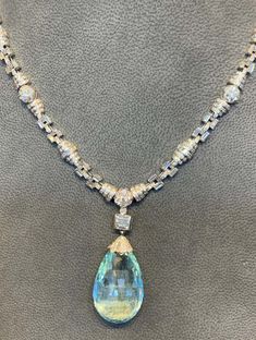 For Sale on 1stDibs - Aquamarine and Diamond Necklace Briolette aquamarine approximate weight: 40 cts 18K white gold Measurements: 16' long Contemporary Art Deco, Pearl And Diamond Necklace, Diamonds Necklace, Art Deco Necklace, Pearl Diamond, Diamond Pendant Necklace, Gold Platinum, Diamond Art, Natural Pearls