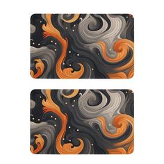 two coasters with an orange and grey swirl design