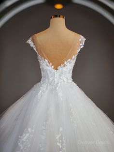 the back of a wedding dress on display