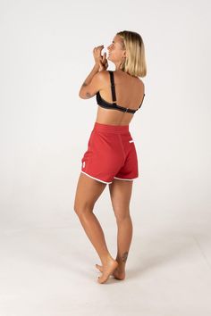 A long and baggy fit, these double lined, high-waisted board shorts designed to be vintage in style and flattering in cut. Featuring two size options for drawstring eyelets to allow a tighter waistline should you be in between sizes. Double lined for ultimate comfort, durable wearing, and non-transparent when wet. By recycling plastic bottles to form a comfortable fabric, feel good knowing your trunks have just saved the equivalent of approximately 7 bottles from landfill. Featuring: 4-way stretch Vintage cut Double lined for enhanced comfort and durability Approx 7 plastic bottles recycled into every pair Quick dry back pocket hidden zip Studio model wears size Small. Womens Board Shorts Swimwear, Womens Board Shorts, Recycling Plastic Bottles, Recycling Plastic, Board Shorts Women, Shorts Swimwear, Hemp Clothing, Womens Wetsuit, Sustainable Swimwear