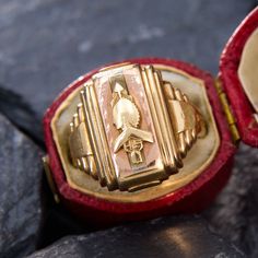 This attractive mens class ring is dated 1950.  We have left the ring unpolished to capture its natural patina.  Most of the detail on the top of the ring has been lost to time but it appears to be an arrow shot through a heart with the letters SH and a rose gold detail.  The ring is crafted in 10k yellow gold and is currently a size 8.25. Vintage Ceremonial Rings With Polished Finish, Antique 14k Gold Rare Signet Ring, Antique Signet Ring With Maker's Mark, Vintage Ceremonial Hallmarked Signet Ring, Collectible Art Deco Signet Ring With Polished Finish, Art Deco Engraved Signet Ring, Vintage Signet Ring With Lost Wax Casting As Gift, Vintage Ceremonial Rings With Engraving, Antique Signet Ring With Maker's Mark For Collectors