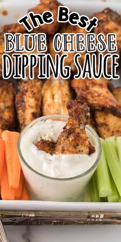 the best blue cheese dipping sauce in a bowl with carrots and celery