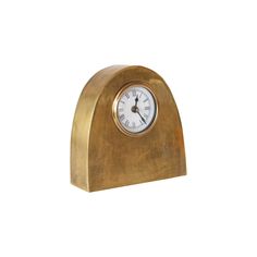 a gold clock on a white background