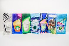 an art project made out of four different colored papers with pictures of beverages on them