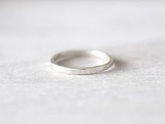 Simple Hammered Ring Jewelry, Minimalist Hammered Stackable Rings, Minimalist Hammered Midi Rings For Anniversary, Simple Hammered Stackable Rings For Gifts, Simple Hammered Stackable Rings For Gift, Simple Hammered Stackable Rings As Gift, Simple Hammered Stackable Rings Gift, Minimalist Hammered Silver Stackable Rings, Simple Stackable White Gold Rings