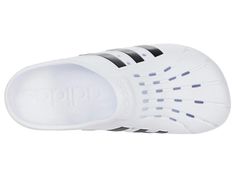 The adidas Adilette Clog - comfortable enough for the gym, cool enough for Instagram. Featuring a soft EVA footbed and sport-inspired design, these iconic slides are perfect for both working out and showing off your casual style in photos. Sporty Breathable Clogs For Sports, Sporty White Clogs For Summer, White Sporty Clogs For Summer, Sporty Synthetic Slip-on Clogs, Sporty Fade-resistant Clogs For Sports, Sporty White Summer Clogs, Adidas Logo Synthetic Slides For Sports, Sporty White Clogs For Sports, White Sporty Clogs For Sports