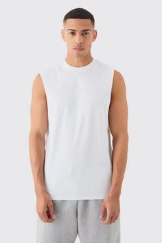 Basic Drop Armhole Tank | boohooMAN USA Sleeveless Muscle Tee For Summer Sports, White Sleeveless Muscle Tee For Summer, Summer Muscle Tee For Gym, Cotton Top For Gym In Summer, Cotton Gym Top For Summer, Summer Cotton Gym Top, Summer Gym Cotton Top, Summer White Muscle Tee, Summer Sports Tops With Dropped Armholes