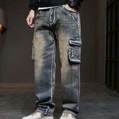 If you have any confusion about what trousers to choose to go with an endless stylish look, find the better solution with these hip-hop trousers. The magnificent stripe design helps distinguish it from other trousers around. It is fashioned to meet the demanding needs of trendy men. These baggy denim trousers will add style to your winter look. Own these trousers at an affordable rate with a click.Specifications Waist Type: MID Thickness: Midweight Style: High Street Place Of Origin: China (Mainland) Origin: Mainland China Material: Denim Length: Full Length Jeans Style: STRAIGHT Item Type: JEANS Gender: MEN Fit Type: STRAIGHT Fabric Type: Stripe Closure Type: Zipper Fly CN: Jiangsu Brand Name: GeraldBlack Applicable Season: Autumn And Winter Applicable Scene: Casual When purchasing clothi Denim Cargo Jeans For Streetwear, Hip Hop Streetwear Jeans Full Length, Hip Hop Streetwear Full Length Jeans, Hip Hop Straight Leg Jeans With Side Pockets, Hip Hop Style Straight Leg Jeans With Side Pockets, Hip Hop Denim Blue Bottoms With Five Pockets, Hip Hop Style Baggy Full Length Jeans, Urban Style Baggy Straight Cargo Jeans, Urban Baggy Straight Cargo Jeans