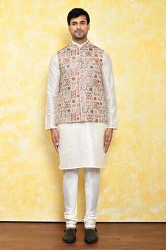 Multicolored bundi with floral motifs. Paired with a plain peach kurta and churidar. - Aza Fashions Diwali Printed Chanderi Nehru Jacket, Diwali Chanderi Nehru Jacket With Printed Motifs, Diwali Nehru Jacket With Printed Motifs In Chanderi, Spring Wedding Nehru Jacket With Printed Motifs, Traditional Spring Bandhgala With Printed Motifs, Spring Designer Nehru Jacket With Printed Motifs, Spring Nehru Jacket With Printed Motifs For Designer Wear, Spring Nehru Jacket With Printed Motifs, Festive Nehru Jacket With Printed Motifs