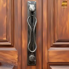 a door handle on a wooden door