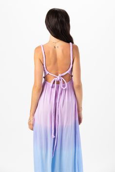 Introducing our enchanting Starlight Maxi Dress, featuring an open tie-back closure, designed to captivate attention and exude effortless charm. This stunning piece seamlessly blends elegance with a hint of allure, making it the perfect choice for any occasion. Details: 100% Rayon Hand wash cold & lay flat to dry Features: Unlined, Smocked scoop neck bodice, Thick rope straps with adjustable self tie feature, Open back detail, Ankle length maxi skirt, Dual side slits Vacation Backless Dress With Lace-up Back, Purple Maxi Dress With Spaghetti Straps For Beach, Beach Backless Strappy Dress With Tie Back, Beach Maxi Dress With Tie And Low Back, Backless Sundress Maxi Dress With Lace-up Back, Chic Beach Maxi Dress With Lace-up Back, Strappy Backless Dress For The Beach, Low Back Tie Back Maxi Dress For Beach, Summer Vacation Midi Dress With Lace-up Back