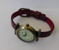 This is a wrist watch made with a round 1 inch diameter watch head, made in alloy, aged bronze finish, free of nickel and lead. Analog, quartz, battery operated (new battery inside). The wristband is made with leather and fit from 6 to 7.25 inches wrist. Thank you for stopping by! Vintage Adjustable Metal Watch Accessories, Brown Adjustable Watch Accessories With Metal Dial, Brown Watch Accessories With Metal Dial And Adjustable Fit, Elegant Watch, Watch Women's, Simple Watches, Watches Women Leather, Minimalist Watch, Aged Bronze