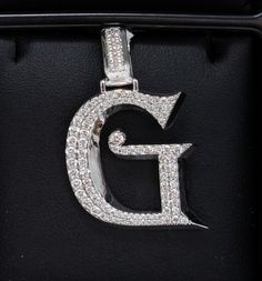 This product is avalilable to pick up in our Miami Lakes store.Features:Quality: 14K Gold.Colour: White Gold.Weight: 6,8gr "Price is only for pendant, chain is not included" Luxury Initials Round Pendant Jewelry, Formal White Gold Jewelry With Initials, Classic Diamond Jewelry With Initials, White Gold Pendant With 17 Jewels, Luxury Silver Necklace Gia Certified, Luxury Gia Certified Gold Necklaces, Silver Initial Pendant With Diamond Cut, Luxury Initials Jewelry In Cubic Zirconia, Formal Initials Jewelry In Cubic Zirconia