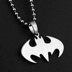 PRICES MAY VARY. Batman Necklace Stainless Steel Comic Super Hero 23" Chain And Pendant MATERIAL: Stainless Steel PENDANT SIZE: 1.25" Batman Design TOTAL CHAIN LENGTH: 23" Great for Party Favors, Gifts, Decoration Batman Dark Knight Necklace Bruce wayne's Logo Pendant Features Batman Symbol, Stainless Steel Metal With Chain Batman Pendant Size: Approx. 1.5" Chain Length: Approx. 23" Batman Jewelry, Super Hero High, Batman Gifts, قلادات متدلية, Chain And Pendant, The Batman, Stainless Steel Pendant, Stainless Steel Necklace, Silver Pendant Necklace