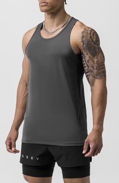 Cut from a soft, lightweight AeroSilver knit with antimicrobial and moisture-wicking properties, this tank keeps you comfortable through the toughest workout. 28 1/2" length (size Medium) Scoop neck AeroSilver polyester yarn with silver ions built into the fiber is engineered to inhibit the growth of odor-causing bacteria Moisture-wicking fabric engineered for dryness and comfort 85% polyester, 15% spandex Machine wash, line dry Imported Functional Compression Top With Scoop Neck, Gray Activewear For Training During Sports Season, Solid Color Moisture-wicking Activewear For Sports Season, Gray Go-dry Athleisure Top, Compression Racerback Tank Top With Light Support, Seamless 4-way Stretch Tank Top For Training, Solid Seamless Tank Top For Training, Breathable Solid Activewear For Light Sports, Solid Breathable Activewear For Light Sports