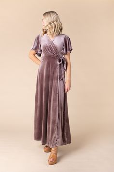 Soft velvet wrap maxi with tie belt Flutter sleeves Gathered below bust line. Please size up for larger bust line Fabric content - Polyester - Dry clean only recommended Getaway Dress, Modest Maxi, Velvet Wrap Dress, Maternity Nursing Dress, Dress Dusty, Solid Color Dress, Nursing Dress, Short Dresses Casual, Midi Maxi Dress