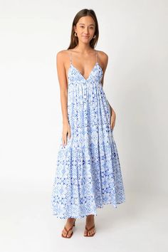 Find the Donna White and Blue Boho Print Midi Dress at BohoPink.com! Cute blue and white boho print midi dress with cami straps. Express shipping is available! Tiered Sundress Midi Dress For Brunch, Flowy Tiered Midi Dress For Day Out, Tiered Ruffle Hem Sundress For Brunch, Tiered Sundress With Ruffle Hem For Brunch, Brunch Tiered Skirt Dress With Ruffle Hem, Daywear Tiered Sundress, Midi Length Sundress With Ruffle Hem For Daywear, Tiered Midi Dress For Summer Daywear, Ruffled Midi Sundress For Brunch