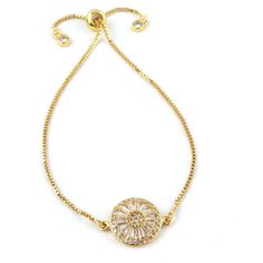 Add a touch of sparkle to your look with the Harper Adjustable Chain Bracelet in Gold. This chain bracelet features a round center encrusted with sparkling Crystals framed in metallic detail.Set on a dainty chain with an adjustable slider. Whether worn solo or as part of a stack, the Harper Adjustable Chain Bracelet will make your outfit shine. Gold Plated Over Brass Small Center stone 16mm 9.5" circumference Large: 20mm on pendant 975" circumference Material: cubic zirconia Adjustable Round Cubic Zirconia Chain Bracelet, Adjustable Chain Round Bracelet For Party, Adjustable Cubic Zirconia Chain Bracelet, Adjustable Chain Bracelet For Party, Zodiac Bracelet, Dainty Chain, Gold Plated Bracelets, Trend Fashion, Sparkling Crystal