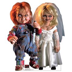 two dolls dressed as bride and groom, one holding a knife to the other's head