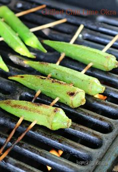 grilled green beans on the grill with toothpicks