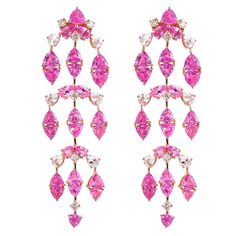 Sunita Nahata presents an exclusive collection of pink sapphire earrings. This particular earring showcases dangling sapphires and diamonds, and is constructed to fall elegantly on the wearer. Designer pink sapphire earring in 18K rose gold with diamonds. Pink Sapphire: 14.459 carats in trillion and pear shape. White Sapphire: 2.18 carats, pear shape. Diamonds: 0.47 carat, G colour, VS clarity. Gold: 13.617g, 18K rose gold. Earring Length: Approximately 6.0cm. Butterfly push and post. E189 Astrid Leong, Long Diamond Earrings, Pink Sapphire Jewelry, Sapphire Earring, Stunning Aesthetic, Pink Sapphire Earrings, Sapphire And Diamond Earrings, Dope Makeup, Diamond Earring