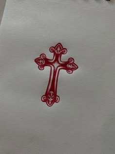 the cross is drawn on paper with red ink