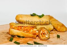 some food is laying out on a cutting board