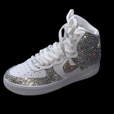 Welcome, Nike Airforce 1’s High Tops With Luxe Crystal & Crystal Ab Bling Ticks Fronts & Back Design, Made To Last Permanent Design! Colours:Iridescent Crystal Diamond & Crystal Iridescent Ab All Colours Available Please See Colour Chart Attached, Brand New In Box Nike Airforce 1’s High Tops Sizes In Usa Women’s 6 6.5 7 7.5 8 8.5 9 9.5 10 10.5 11 11.5 12 12.5 13 Comes With Original & Ribbon Laces To Order; Can Also Be Made In Black Please See Colour Chart Attached To Change Colour Way Or Add Add Bling Sneakers With Round Toe For Streetwear, White Synthetic Sneakers With Glitter, White High-top Sneakers With Glitter Accents, Sporty Bling Sneakers For Streetwear, White Iced Out Sneakers For Streetwear, Sporty Streetwear Sneakers With Bling, White Embellished Sneakers For Streetwear, Silver High-top Sneakers With Bling, White Synthetic Sneakers With Bling