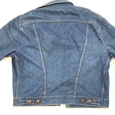 Vintage Lee Denim Jacket 1970s made in USA 100% cotton size: medium measurements: armpit to armpit: 23.5” top of neck to bottom: 25” Vintage Pre-washed Cotton Denim Jacket, Retro Medium Wash Denim Jacket With Snap Buttons, Retro Denim Jacket With Snap Buttons In Medium Wash, Retro Medium Wash Long Sleeve Denim Jacket, Retro Denim Tops With Pockets, Fitted Medium Wash Cotton Denim Jacket, Retro Fitted Denim Outerwear, Fitted Retro Denim Outerwear, Fitted Retro Denim Jacket For Fall