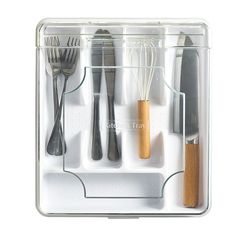 an organized kitchen utensils tray with spoons and forks